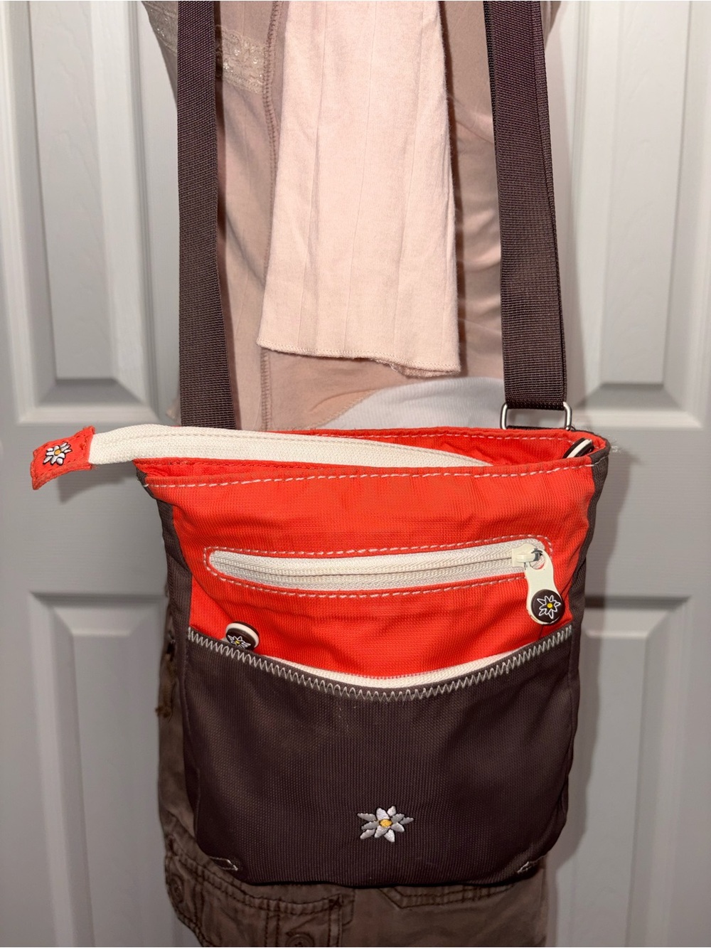 Sherpani Orange and Dark Brown Crossbody Bag with Floral Charm